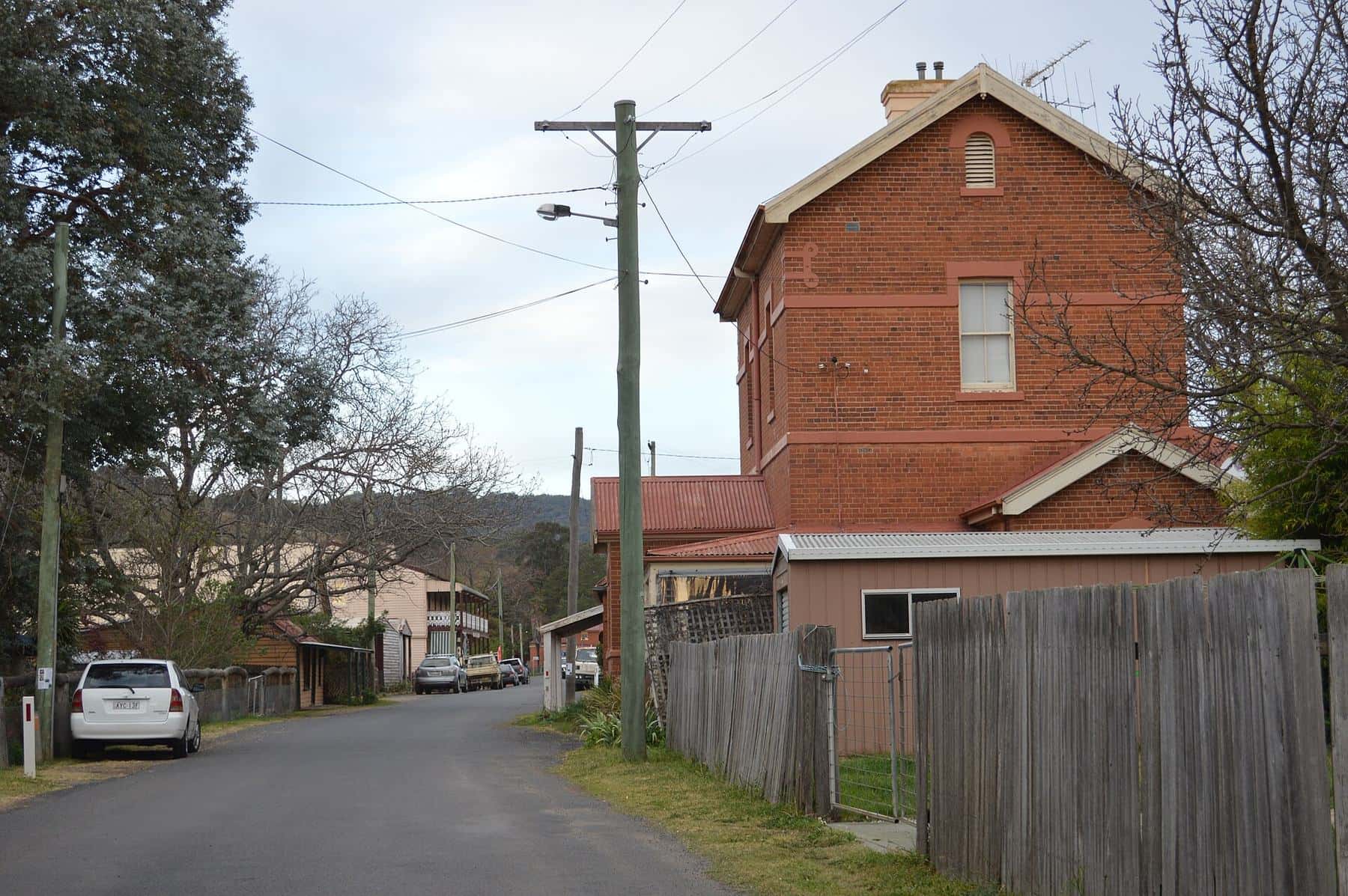 Weatherboard shopfronts and verandahs along Denison Street in the gold town of Sofala